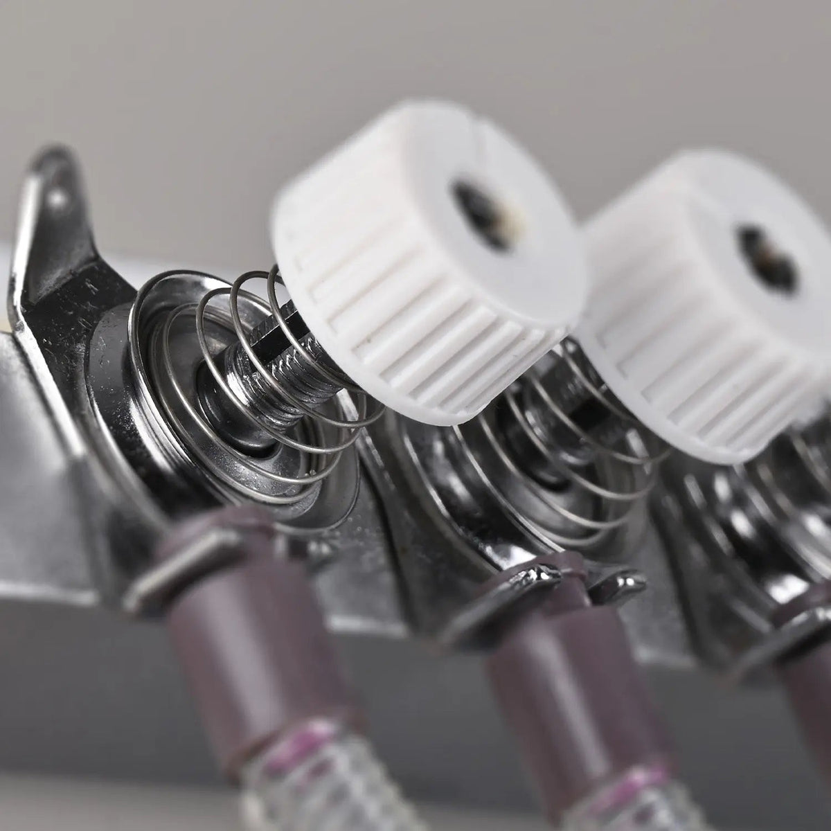 Tension spring (upper knob)